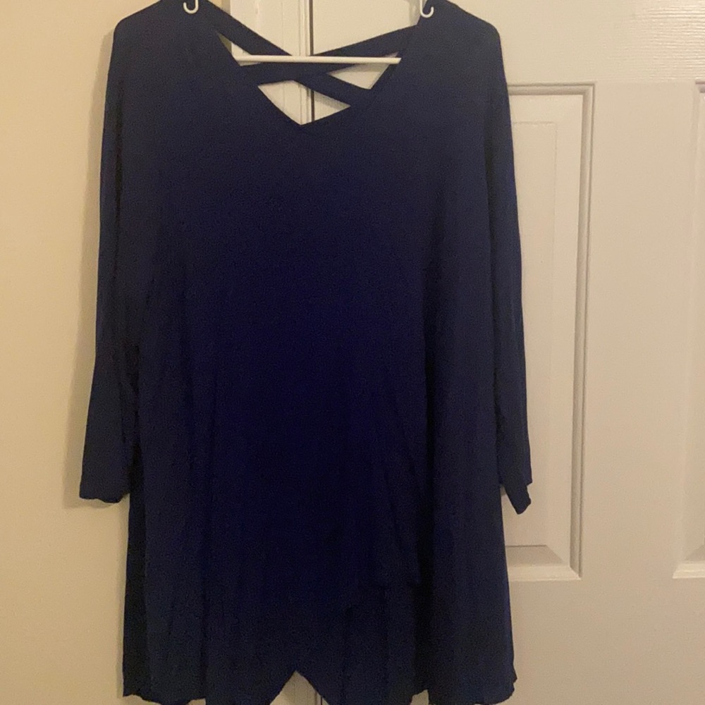 Dark blue Tunic with cross detail on back.